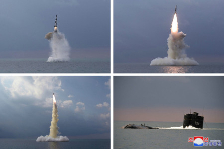 19日、北朝鮮の国防科学院による新型の潜水艦発射弾道ミサイル(SLBM)の試射(朝鮮通信・時事)
