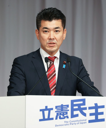 立憲民主党の新代表に選出され、記者会見する泉健太氏=30日午後、東京都港区