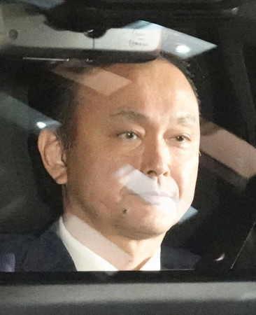 銀行団との協議を終え、会場を後にするビッグモーターの和泉伸二社長=10月27日、東京都内