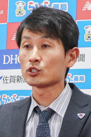 金明輝氏